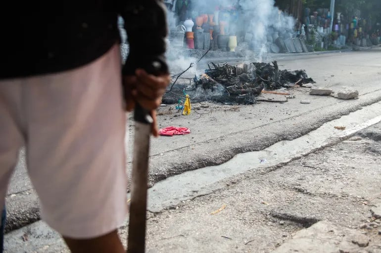 gang members used machetes and knives to kill at least 60 people on december 6 2024 and 50 on december 7 2024 a human rights group says photo afp