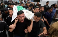 palestinians react as they carry the bodies during the funeral of al qassam brigades commander izz al din al baik and his bodyguard who were killed in an israeli airstrike that targeted an apartment according to medics in gaza city september 29 2026 reuters