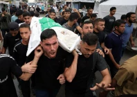 palestinians react as they carry the bodies during the funeral of al qassam brigades commander izz al din al baik and his bodyguard who were killed in an israeli airstrike that targeted an apartment according to medics in gaza city september 29 2026 reuters