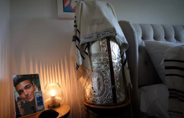 a torah and a photograph of edan alexander the american israeli and israel defense forces soldier taken hostage during the october 7 2023 attack on israel by hamas sit in his home during a family interview with reuters in tenafly new jersey us december 14 2024 photo reuters a torah and a photograph of edan alexander the american israeli and israel defense forces soldier taken hostage during the october 7 2023 attack on israel by hamas sit in his home during a family interview with reuters in tenafly new jersey us december 14 2024 photo reuters