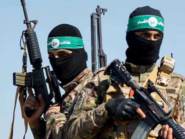 armed wing of hamas take part in a military parade near the border in the central gaza strip photo reuters armed wing of hamas take part in a military parade near the border in the central gaza strip photo reuters