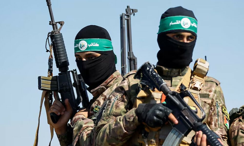 armed wing of hamas take part in a military parade near the border in the central gaza strip photo reuters