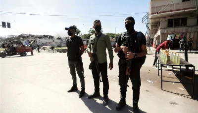 hamas police officers stand guard amid a ceasefire between israel and hamas in gaza city october 11 2025 reuters