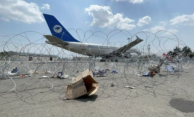 a commercial airplane is seen at the hamid karzai international airport a day after us troops withdrawal in kabul afghanistan august 31 2021 photo reuters