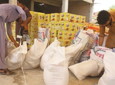 official found handing out hampers from office