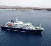 a drone view of the cruise ship mv hondius carrying passengers suspected of having cases of hantavirus on board as it prepares to leave praia cape verde may 6 2026 photo reuters
