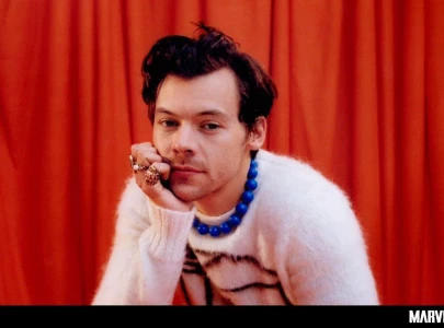 harry styles spotted in paris with a huge bouquet of sunflowers but who were they for harry styles spotted in paris with a huge bouquet of sunflowers but who were they for