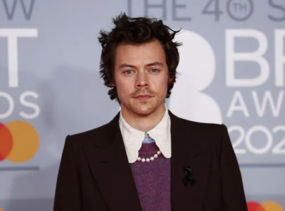 the woman behind harry styles glastonbury moment