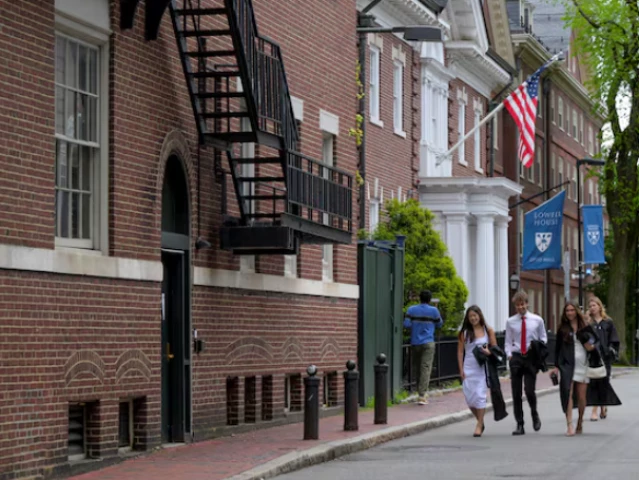 students walk on the campus of harvard university in cambridge massachusetts us may 23 2025 photo reuters students walk on the campus of harvard university in cambridge massachusetts us may 23 2025 photo reuters