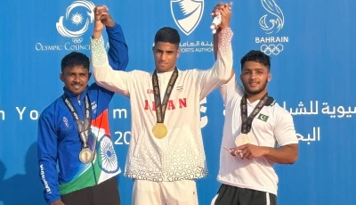 pakistani wrestler hassan ali on the asian youth games podium with his bronze medal photo pakistan olympic association pakistani wrestler hassan ali on the asian youth games podium with his bronze medal photo pakistan olympic association