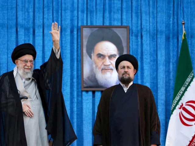 ayatollah ruhollah khomeini s grandson hassan khomeini stands next to iran s supreme leader ayatollah ali khamenei during the 36th anniversary of the death of the leader of iran s 1979 islamic revolution ayatollah ruhollah khomeini at khomeini s shrine in southern tehran iran june 4 2025 file photo office of the iranian supreme leader reuters ayatollah ruhollah khomeini s grandson hassan khomeini stands next to iran s supreme leader ayatollah ali khamenei during the 36th anniversary of the death of the leader of iran s 1979 islamic revolution ayatollah ruhollah khomeini at khomeini s shrine in southern tehran iran june 4 2025 file photo office of the iranian supreme leader reuters