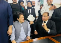 a file photo of pti founder imran khan and advocate salman safdar pti usa official