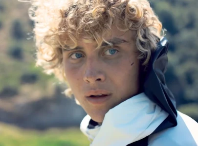 the hunger games sunrise on the reaping trailer debuts first look at young haymitch