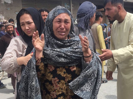 an afghan woman cries after an explosion in front of a high school in kabul afghanistan april 19 2022 photo reuters