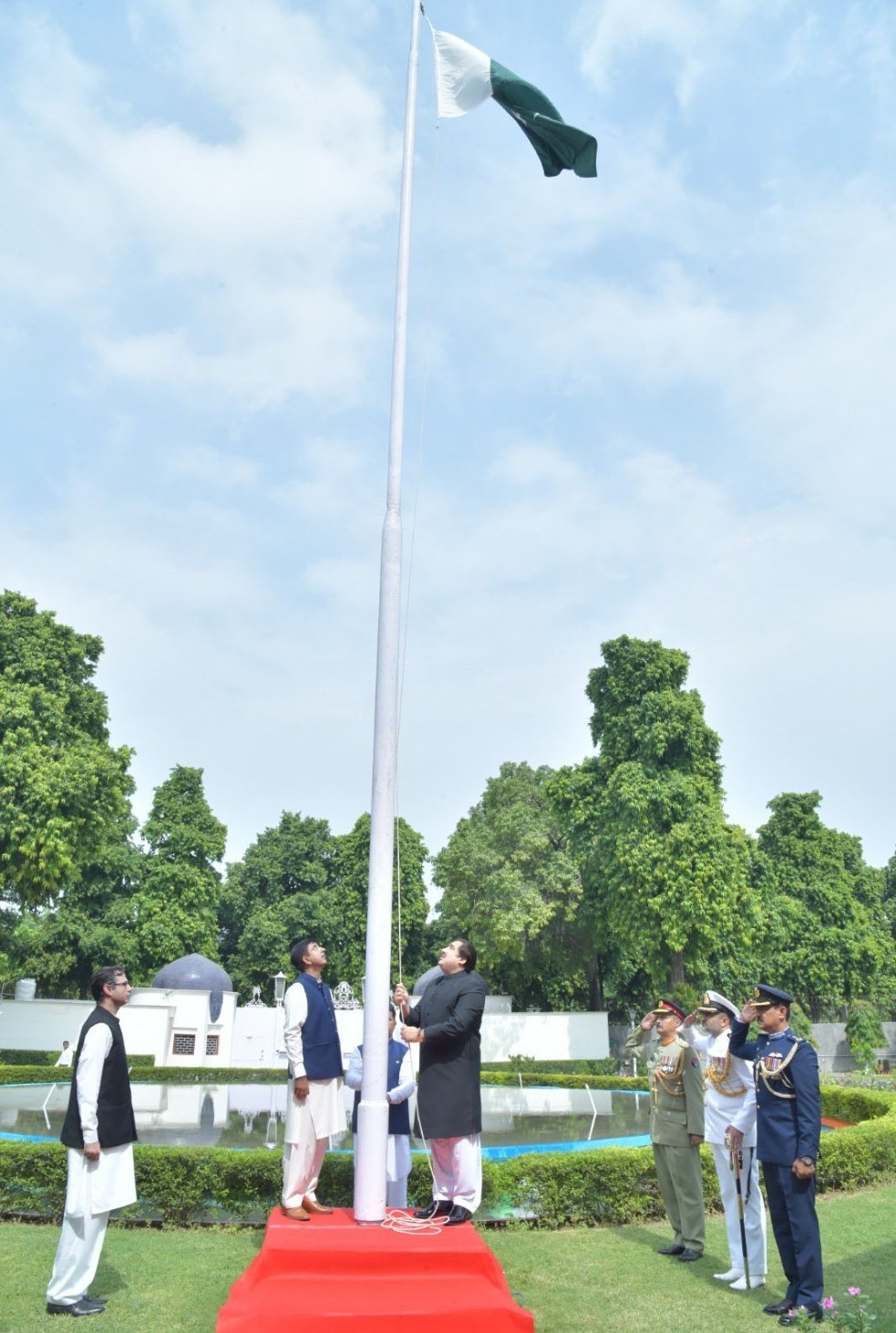 aizaz khan charge d affaires raising pakistan s flag to the tune of national anthem at flag hoisting ceremony held to celebrate 76 anniversary of the independence of pakistan at pakistan high commission new delhi on august 14 2023 photo express