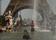 people cool off in the trocadero fountain near to the eiffel tower as temperatures rise during a heatwave affecting a large part of the country in paris france on june 24 2026 photo reuters
