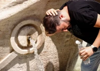 a man cools himself with water from the fontana della barcaccia during a heatwave in rome italy august 6 2026 reuters claudia chieppa