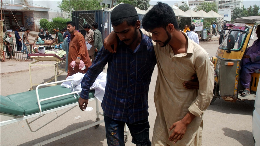 people shift a patient who was affected by heatwave to a hospital in karachi photo aa file