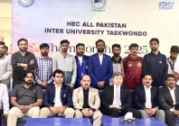 participants of the all pakistan inter university taekwondo championship 2025 pose with chief guests photo organisers