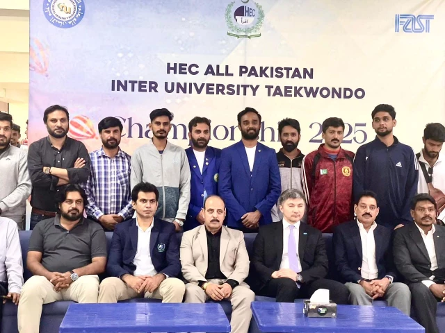 participants of the all pakistan inter university taekwondo championship 2025 pose with chief guests photo organisers