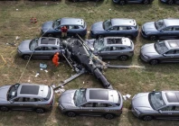 an aerial view shows the site of a helicopter crash in the recreio dos bandeirantes neighbourhood in rio de janeiro brazil on june 14 2026 at least six people died in brazil on june 14 after two helicopters crashed in western rio de janeiro after a suspected mid air collision firefighters said photo afp
