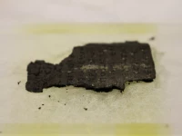 fragment of herculaneum scroll is fixed in place at a diamond light source experimental station after it was scanned using bright x rays in didcot britain september 30 2019 photo file reuters