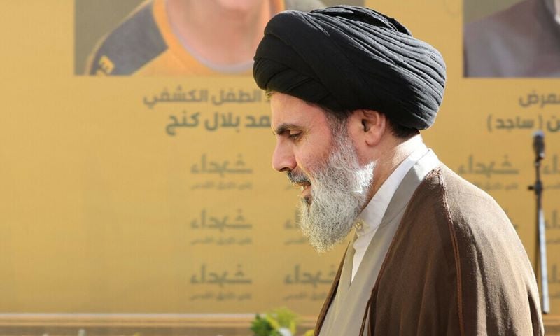 the head of hezbollah s executive council hashem safieddine attends the funeral of members of the group in beirut s southern suburbs photo afp