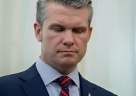 u s defense secretary pete hegseth closes his eyes as he stands by us president donald trump not pictures in the oval office at the white house in washington d c u s march 21 2025 photo reuters