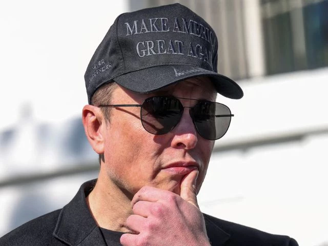 tesla ceo elon musk looks on next to u s president donald trump talking to the media at the white house in washington d c u s march 11 2025 photo reuters tesla ceo elon musk looks on next to u s president donald trump talking to the media at the white house in washington d c u s march 11 2025 photo reuters