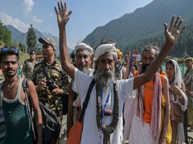 hindu pilgrims gesture as they begin their pilgrimage to the cave shrine of amarnath from a base camp in pahalgam on june 28 2024 file afp hindu pilgrims gesture as they begin their pilgrimage to the cave shrine of amarnath from a base camp in pahalgam on june 28 2024 file afp
