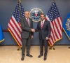 mohsin naqvi and kash patel shake hands at fbi headquarters in washington