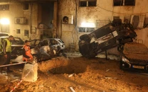 iran launches fresh missile waves on tel aviv damage reported in holon