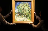 staff members pose with vincent van gogh s chataigniers en fleurs chestnut trees in blossom at a media preview ahead of its auction in new york at sotheby s in hong kong china photo reuters
