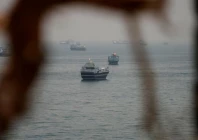 vessels are anchored in the strait of hormuz as seen from musandam oman june 11 2026 reuters