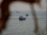 vessels are anchored in the strait of hormuz as seen from musandam oman june 11 2026 reuters