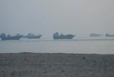vessels in the strait of hormuz as seen from musandam oman june 15 2026 reuters