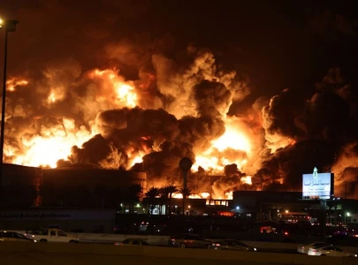 saudi aramco storage petroleum facility hit by houthi attack causing fire