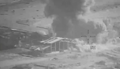 smoke rises from an explosion at an unknown location during what the us central command centcom says are strikes on iranian military targets in this screengrab taken from a handout video released on july 23 2026 u s central command via reuters