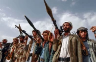 armed tribesmen loyal to the huthi rebels brandish their weapons at a gathering in the capital sanaa to mobilize more fighters to battlefronts to fight pro government forces in several yemeni cities june 20 2016 photo afp