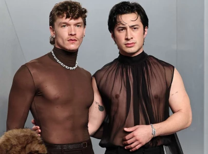 heated rivalry duo brings matching heat to the vanity fair oscar party