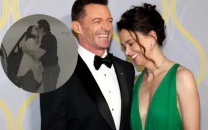 hugh jackman and sutton foster pack on the pda at in n out after going public
