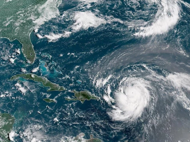 hurricane erin which is the first hurricane of the 2025 atlantic season and has developed into a dangerous category 4 hurricane moves westward near puerto rico in a composite satellite image august 16 2025 photo reuters