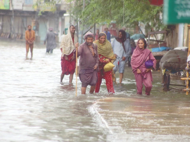 people wade through rainwater in a hyderabad locality due to urban flooding caused by heavy rain and dysfunctional drainage system photo express people wade through rainwater in a hyderabad locality due to urban flooding caused by heavy rain and dysfunctional drainage system photo express