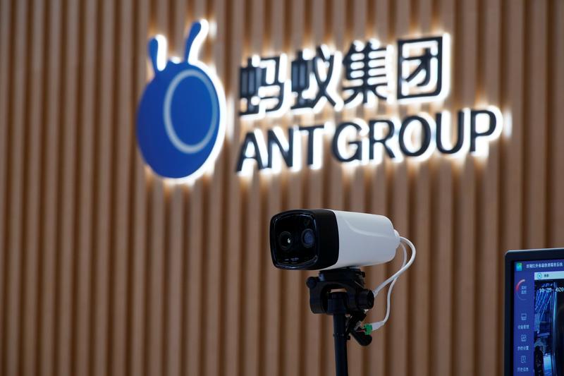 a thermal imaging camera is seen in front of a logo of ant group at the headquarters of ant group an affiliate of alibaba in hangzhou zhejiang province china october 29 2020 photo reuters