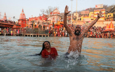 tens of thousands of hindu devotees take holy plunge in ganges tens of thousands of hindu devotees take holy plunge in ganges