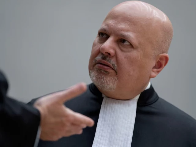 chief prosecutor karim khan talks while waiting for former philippine president rodrigo duterte to appear via video link before the international criminal court icc in the hague netherlands friday march 14 2025 photo reuters chief prosecutor karim khan talks while waiting for former philippine president rodrigo duterte to appear via video link before the international criminal court icc in the hague netherlands friday march 14 2025 photo reuters