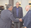 icc deputy chairman imran khawaja and bcb president aminul islam shake hands as pcb chairman mohsin naqvi looks on during a meeting at the pcb headquarters in lahore photo express