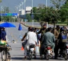 pakistani police officer divert bikers from a road leading to serena hotel as pakistan prepares to host the us and iran for the second phase of peace talks in islamabad on april 22 2026 photo reuters
