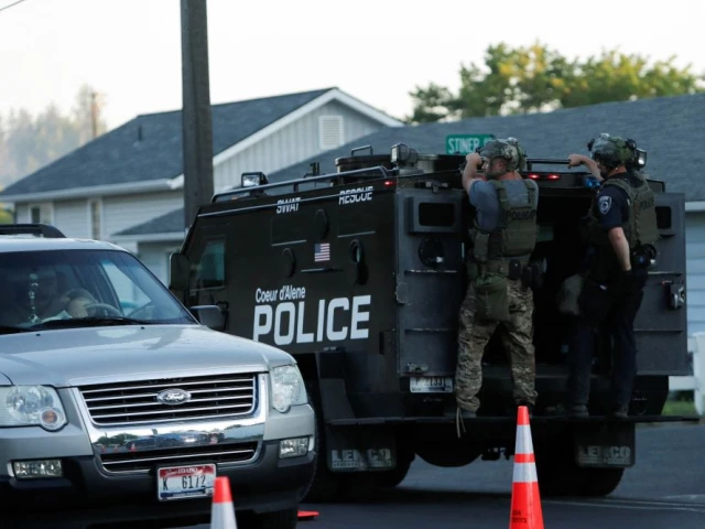 an armored police vehicle leaves an area where multiple firefighters were attacked when responding to a fire in the canfield mountain area outside coeur d alene idaho us june 29 2025 photo reuters an armored police vehicle leaves an area where multiple firefighters were attacked when responding to a fire in the canfield mountain area outside coeur d alene idaho us june 29 2025 photo reuters
