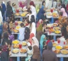 inflation and shrinking household incomes drive growing crowds to free iftar tables organisers say an increasing number of women and low income families are turning to these public iftars highlighting the widening strain on household budgets during the month photo express
